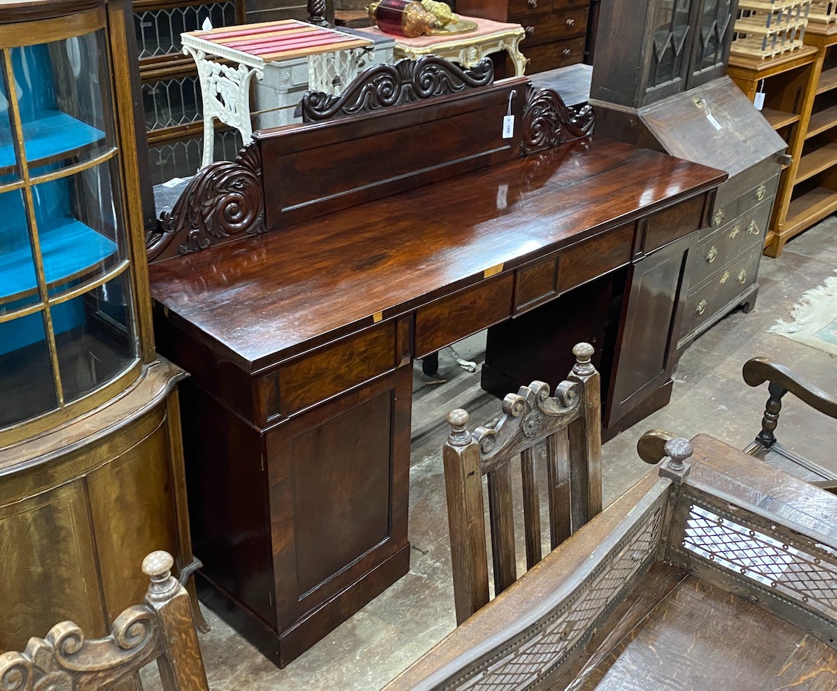 An early Victorian mahogany pedestal sideboard, length 190cm, depth 56cm, height 132cm